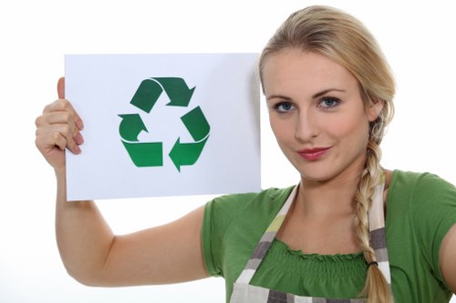 Workers sorting different types of construction waste